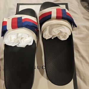 Brand new authentic Gucci "Sylvie Bow Slides"